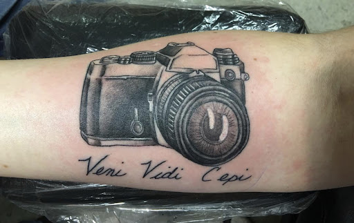 Explore minimalist dog tattoo ideas, creative tattoo ideas in Midlothian, available at Firehouse Tattoos