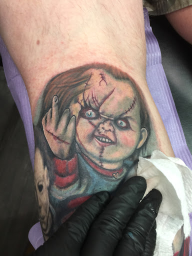 Explore brass knuckle tattoo ideas, creative tattoo ideas in Utica, available at Tattoo U Studio