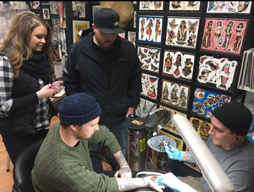 Tattoo Shop «Consolidated Tattoo», reviews and photos, 107 W Kearsley St, Flint, MI 48502, USA