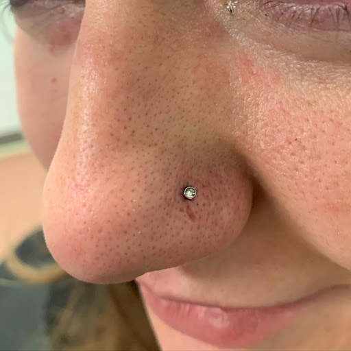 Explore breast cancer ribbon tattoo ideas, creative tattoo ideas in Round Rock, available at Piercings by Toni