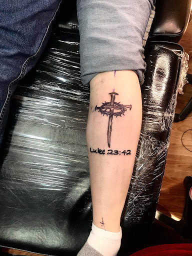 Explore under chin tattoo ideas, creative tattoo ideas in Windsor, available at Spillen Ink