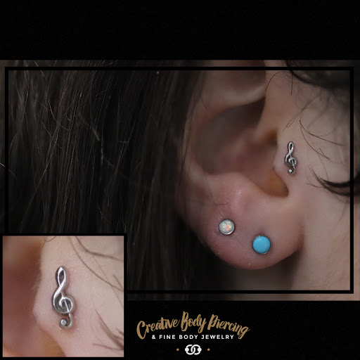 Find simple cat tattoo ideas for your next unique tattoo in Kalispell at Creative Body Piercing & Fine Body Jewelry