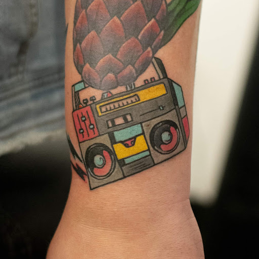 Explore tattoo ideas for arm, creative tattoo ideas in Denison, available at Calypso Tattoo