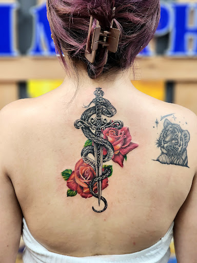 Explore rock music tattoo ideas, creative tattoo ideas in Seattle, available at Dragon Tattoo