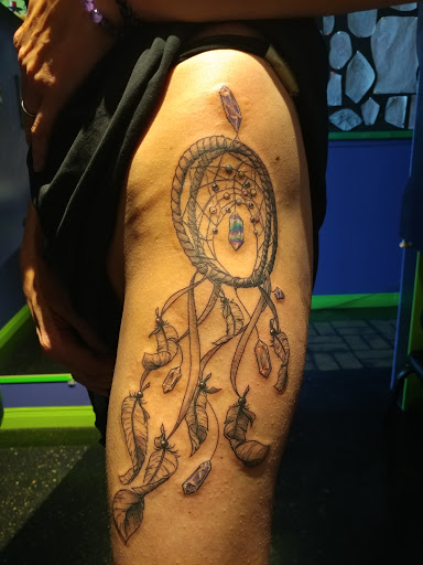 Tattoo Shop «Tit 4 Tat Tattoo Studio Inc.», reviews and photos, 45571 Mound Rd, Shelby Charter Township, MI 48317, USA