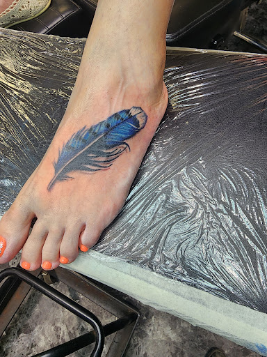 Explore dragonfly tattoo ideas for guys, creative tattoo ideas in Yankton, available at Exquisite Ink