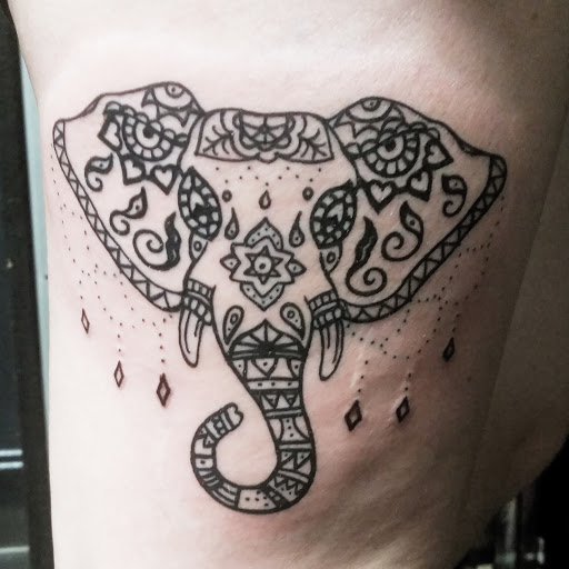 Explore tattoo ideas for ladies back, creative tattoo ideas in Erie, available at EliKingInk