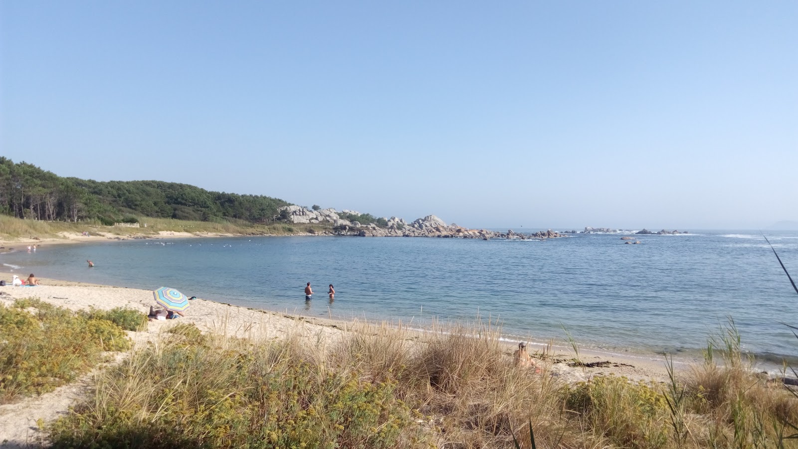 Canelas beach'in fotoğrafı geniş ile birlikte