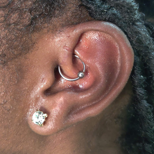 Explore matching tattoos for father and son ideas, creative tattoo ideas in Romulus, available at Urban Rituals Piercing and Tattoo