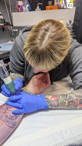 Explore spine tattoo ideas for men, creative tattoo ideas in San Diego, available at Remington Tattoo Parlor