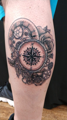 Explore leg tattoo idea for men, creative tattoo ideas in Galesburg, available at Hawks Tattoos