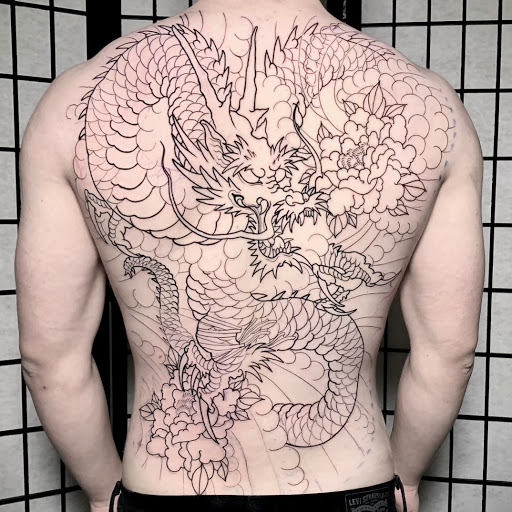 Find best friend matching tattoo ideas for your next unique tattoo in Arlington at Benchmark Tattoos