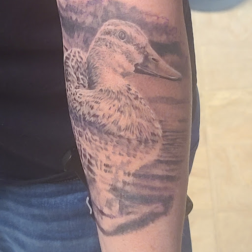 Explore anime sleeve tattoo ideas, creative tattoo ideas in Shelbyville, available at Redline Studio Custom Tattoo