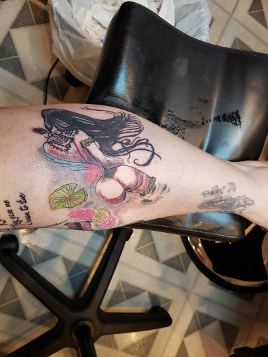 Explore hawaiian flower tattoo ideas, creative tattoo ideas in Davis, available at SIX GUN SOUND TATTOO