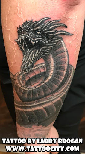 Explore evil eye tattoo ideas, creative tattoo ideas in Lockport, available at Tattoo City by Larry Brogan