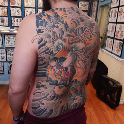 Explore girl tattoo ideas, creative tattoo ideas in Egg Harbor Township, available at Mr. Blue Sky Tattoo