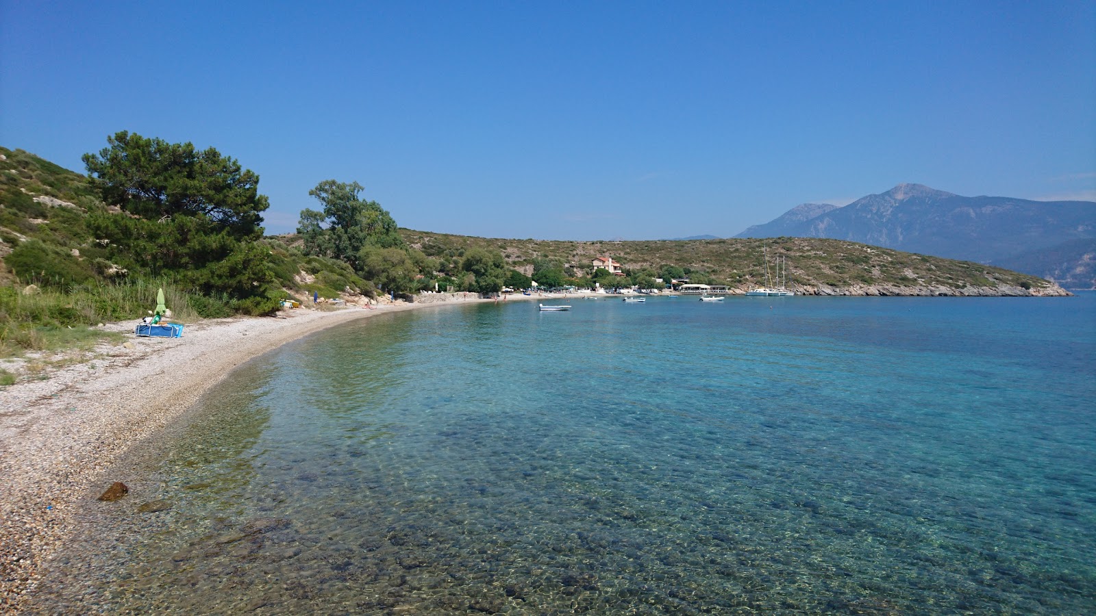 Photo of Vathi beach with turquoise pure water surface