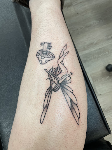 Explore women's hand tattoo ideas, creative tattoo ideas in Plymouth Meeting, available at Shoobie Lee Tattoo Studio