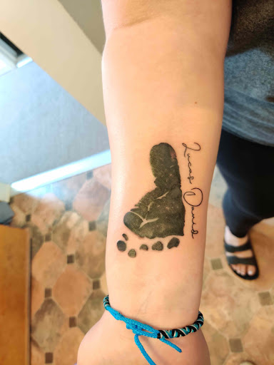 Explore tattoo ideas space liquid tattoo, creative tattoo ideas in Hebron, available at Explosive Ink Tattoo