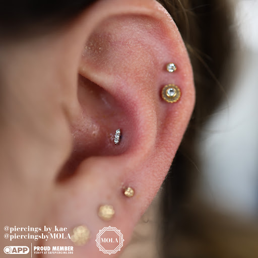 Explore big tattoo ideas female, creative tattoo ideas in Charleston, available at MOLA Piercing and Fine Jewelry