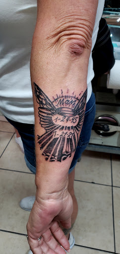 Explore barn owl tattoo ideas, creative tattoo ideas in Englewood, available at The Original Big Daddy Tattoo & Body Piercing est.1997 est.1997