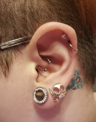 Explore jekyll and hyde tattoo ideas, creative tattoo ideas in Cincinnati, available at Luminous Fine Jewelry and Piercing