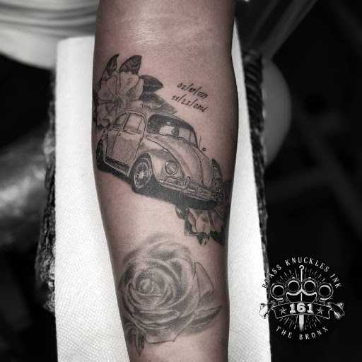 Explore ac dc tattoo ideas, creative tattoo ideas in Bronx, available at Brass Knuckles Ink Tattoo Studio