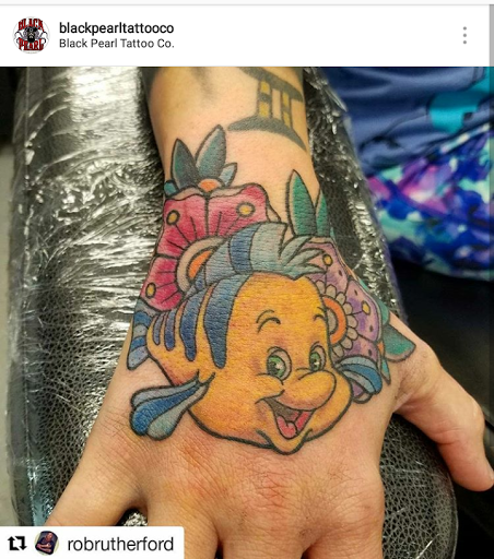 Explore rose idea tattoos, creative tattoo ideas in Clayton, available at Black Pearl Tattoo Company