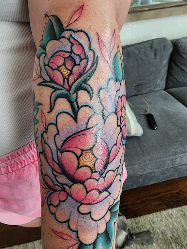 Explore alpha male tattoo ideas, creative tattoo ideas in Little Rock, available at Love Spell Tattoo