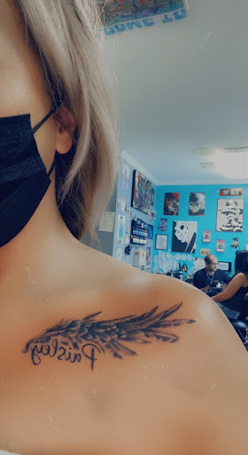 Explore feminine neck tattoo ideas, creative tattoo ideas in Jackson, available at Inkk Culture Tattoo