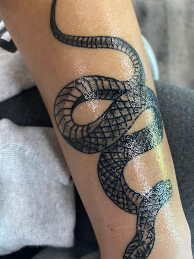 Explore tattoo ideas on belly, creative tattoo ideas in Traverse City, available at Pinups & Needles