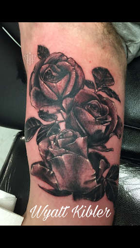 Explore miami dolphins tattoo ideas, creative tattoo ideas in Kent, available at War Horse Ink