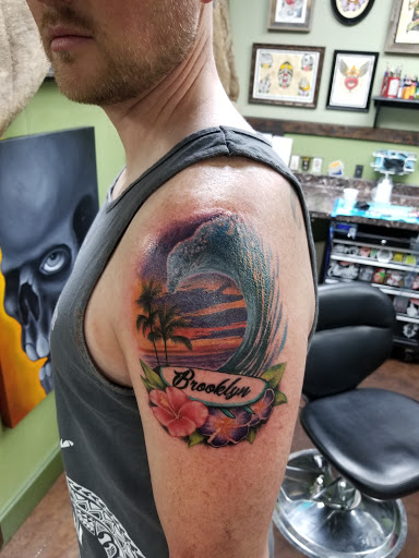 Explore snake tattoo ideas for guys, creative tattoo ideas in Glendale, available at Chosen Art Tattoo