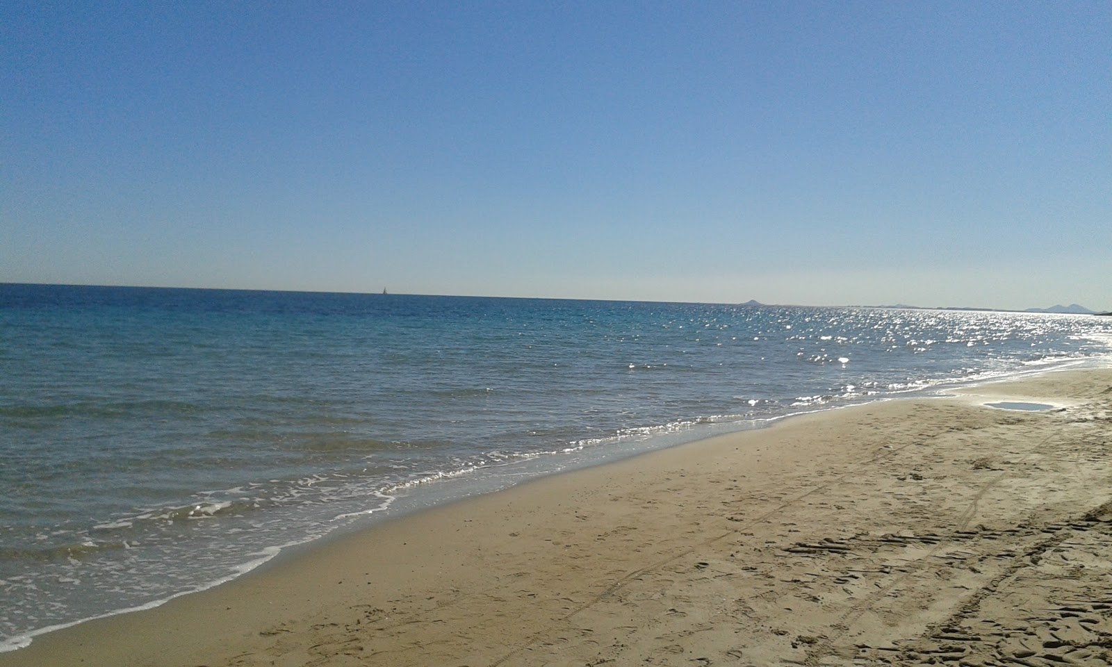 Foto van Campoamor Strand met hoog niveau van netheid