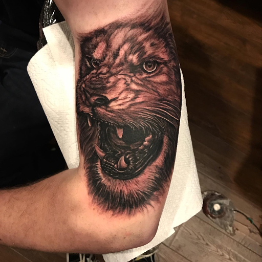 Explore lace tattoo ideas, creative tattoo ideas in Johnson City, available at Gold Cross Tattoo Co.