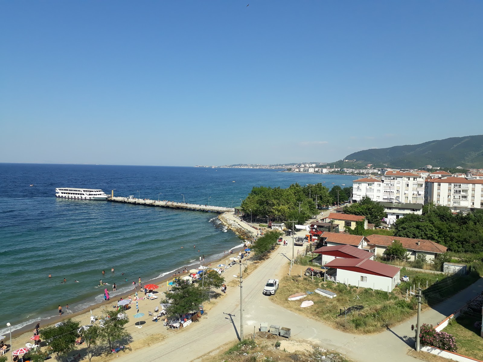 Foto de Kucuk Plaji con arena beige superficie