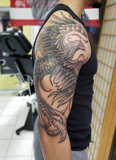 Tattoo Shop «Funky Rooster Tattoo and Art Gallery», reviews and photos, 73 S Grove Ave, Elgin, IL 60120, USA