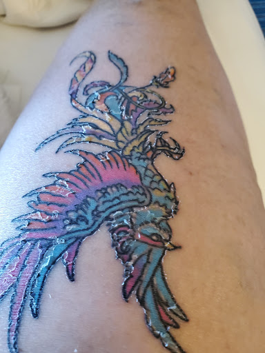 Explore beach tattoo ideas for guys, creative tattoo ideas in Athens, available at United Ink Tattoos and Body Piercings