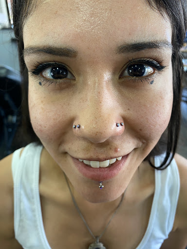 Explore small bts tattoo ideas, creative tattoo ideas in Orange, available at Symbiosis Body Piercing