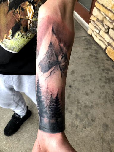 Explore koi fish tattoo sleeve ideas, creative tattoo ideas in Roscoe, available at Elevated Ink Tattoo