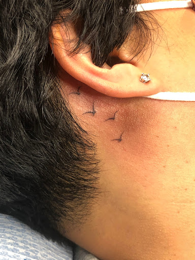 Find music tattoo ideas for men for your next unique tattoo in Scarsdale at Damm Nice Tattoo & Body Art