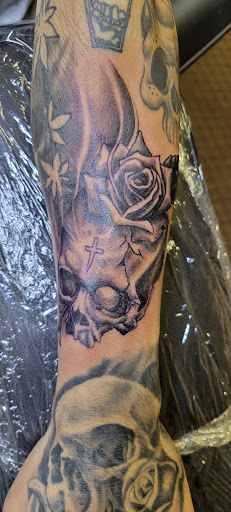 Explore chest cover up tattoo ideas, creative tattoo ideas in Angola, available at Hoodlum Ink