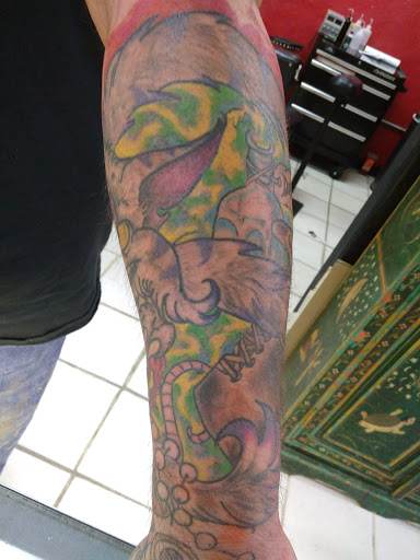 Explore lion sleeve tattoo ideas, creative tattoo ideas in Overland Park, available at Inkslingers Tattoo Studio