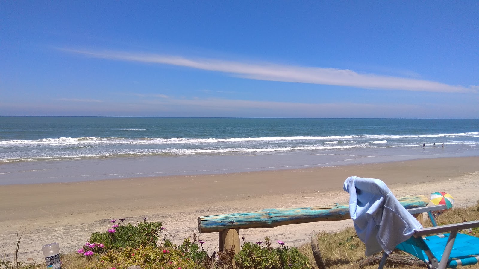 Fotografija Barra do Chui Beach z svetel pesek površino