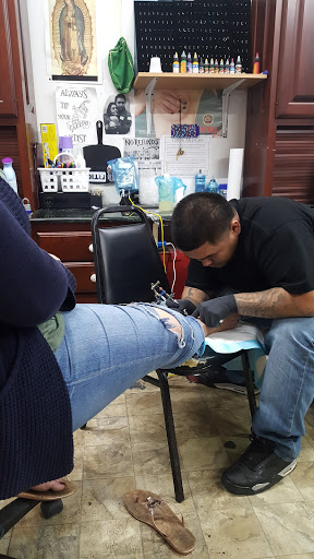 Tattoo Shop «Kings of Ink Tattoos», reviews and photos, 12271 Veterans Memorial Dr, Houston, TX 77067, USA