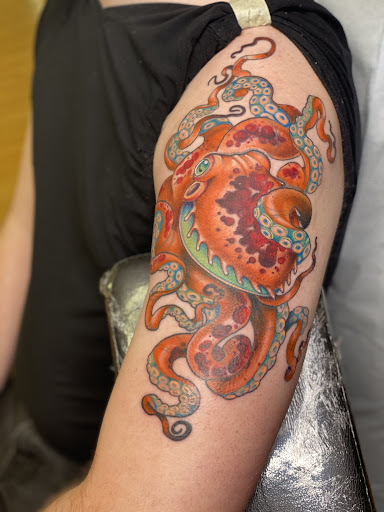 Explore fine line spine tattoo ideas, creative tattoo ideas in Monterey, available at Wholehearted Tattoo