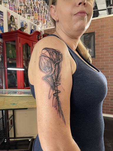 Explore fighting tattoo ideas, creative tattoo ideas in Kissimmee, available at Fallen Heroes Tattoo & Piercing (Florida)