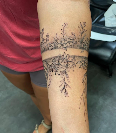 Explore top of foot tattoo ideas, creative tattoo ideas in Navarre, available at Eleven 11 Tattoo Studio