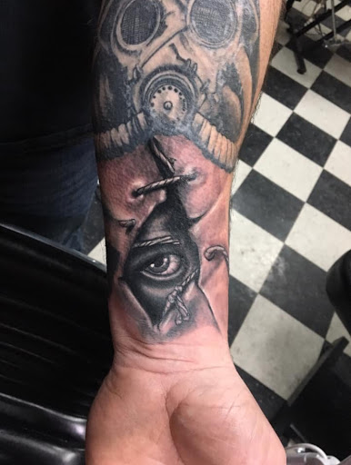 Explore athlete tattoo ideas, creative tattoo ideas in Stevens Point, available at Black Rabbit Tattooing