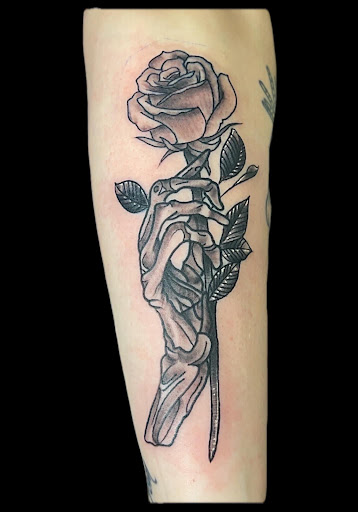 Explore tattoo ideas rose, creative tattoo ideas in Lorain, available at Backwoodz Tattoo Studio
